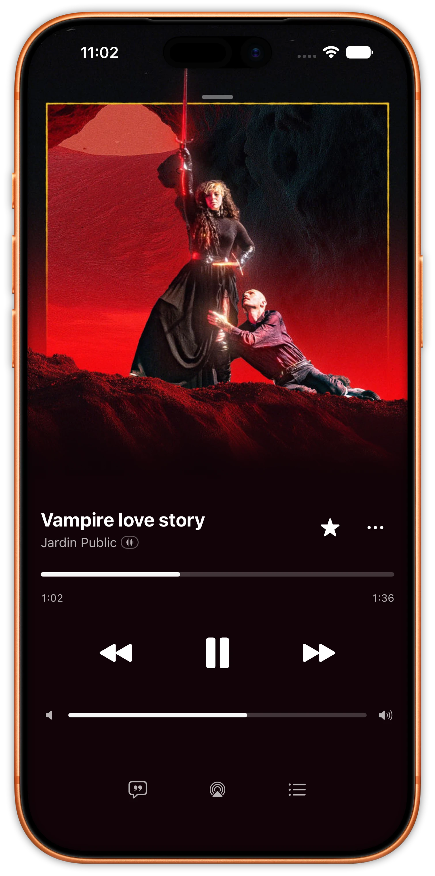 Cassette's player on iPhone, playing Vampire love story by Jardin Public, the screen tinted red by the cover art.