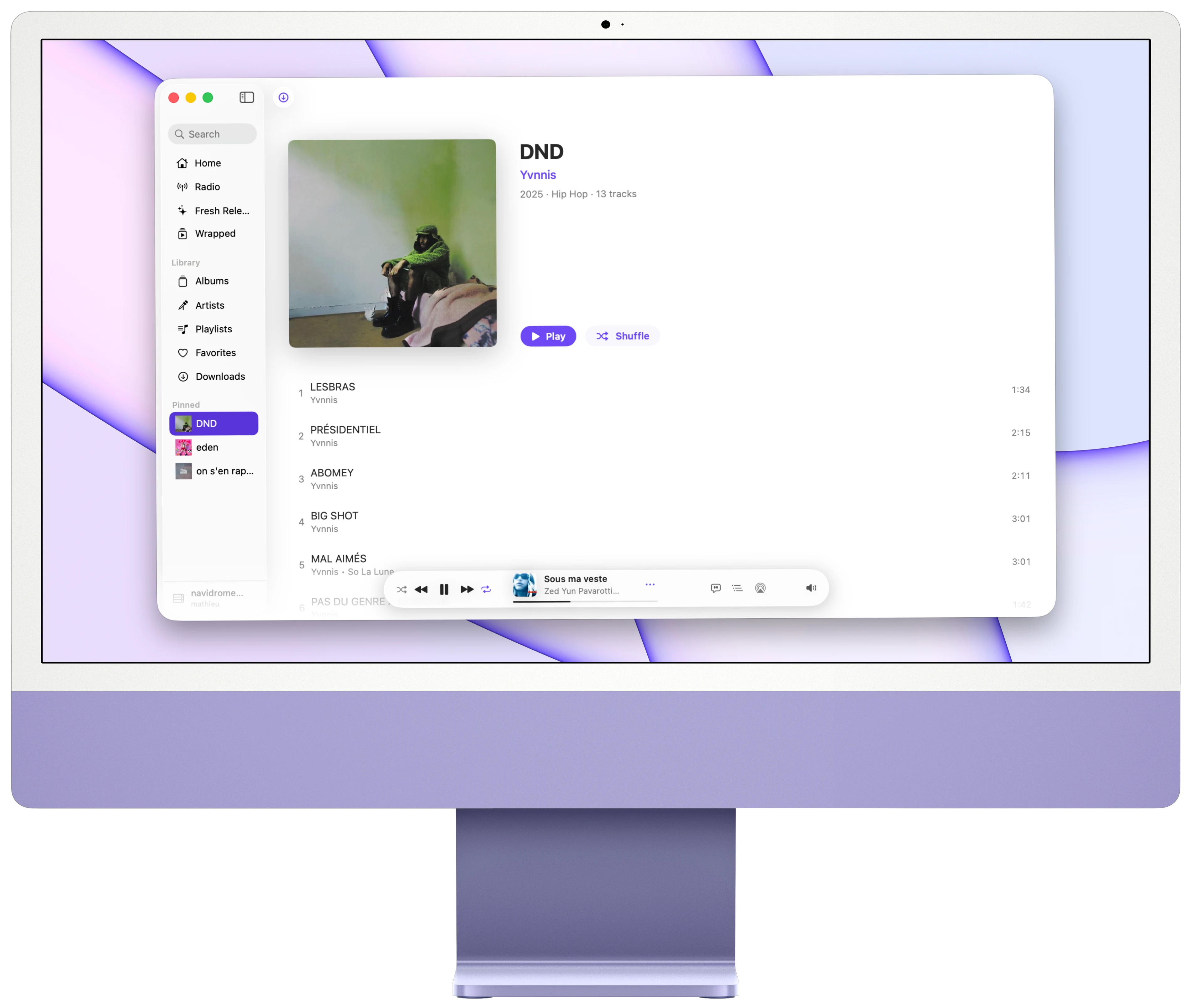 An album page in Cassette on Mac, with the sidebar and the mini player.